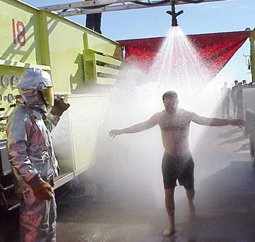 Decontamination using water from fire trucks